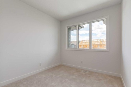 1162 Cobblestone Boulevard, Airdrie, AB - Indoor Photo Showing Other Room