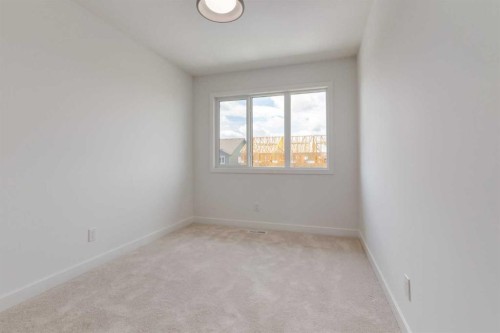 1162 Cobblestone Boulevard, Airdrie, AB - Indoor Photo Showing Other Room