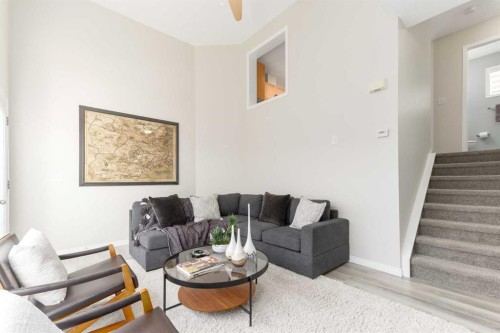 126 Everhollow Heights Sw, Calgary, AB - Indoor Photo Showing Living Room