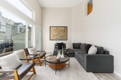 126 Everhollow Heights Sw, Calgary, AB - Indoor Photo Showing Living Room With Fireplace