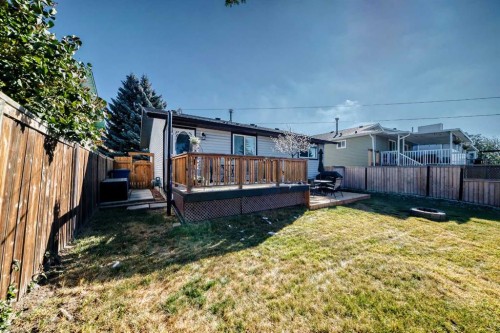 67 Sandstone Crescent Se, Airdrie, AB - Outdoor With Deck Patio Veranda