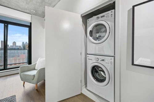 1207-1010 6 Street Sw, Calgary, AB - Indoor Photo Showing Laundry Room