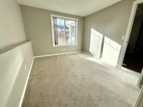 26 Copperfield View Se, Calgary, AB - Indoor Photo Showing Other Room