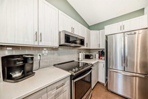 26 Copperfield View Se, Calgary, AB - Indoor Photo Showing Kitchen With Stainless Steel Kitchen