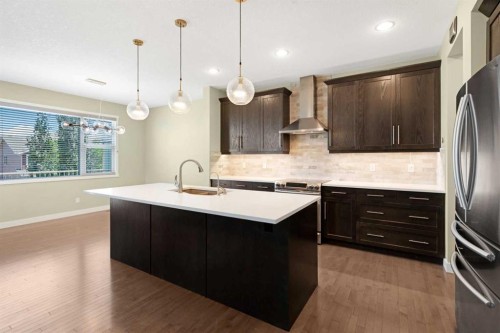 140 Nolancrest Green Nw, Calgary, AB - Indoor Photo Showing Kitchen With Upgraded Kitchen