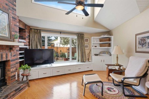 9632 Oakcliffe Drive Sw, Calgary, AB - Indoor Photo Showing Living Room With Fireplace