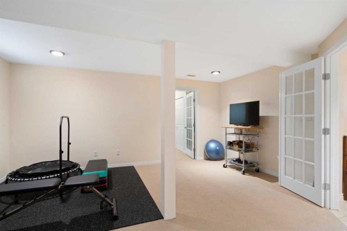 9632 Oakcliffe Drive Sw, Calgary, AB - Indoor Photo Showing Gym Room