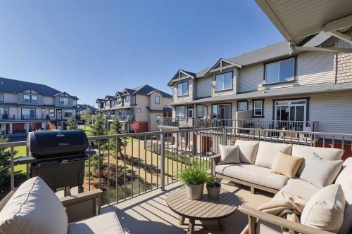 401-1086 Williamstown Boulevard Nw, Airdrie, AB - Outdoor With Deck Patio Veranda