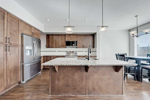 401-1086 Williamstown Boulevard Nw, Airdrie, AB - Indoor Photo Showing Kitchen With Upgraded Kitchen