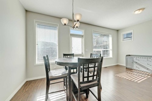 401-1086 Williamstown Boulevard Nw, Airdrie, AB - Indoor Photo Showing Dining Room