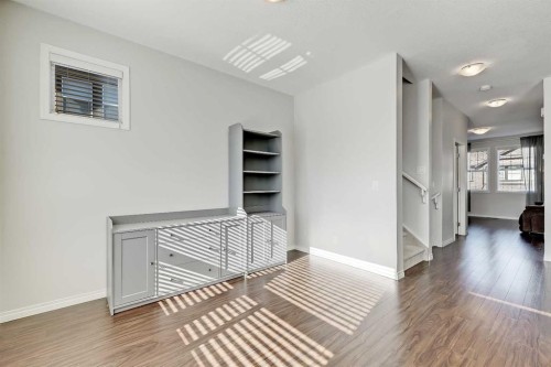 401-1086 Williamstown Boulevard Nw, Airdrie, AB - Indoor Photo Showing Other Room