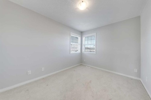 401-1086 Williamstown Boulevard Nw, Airdrie, AB - Indoor Photo Showing Other Room