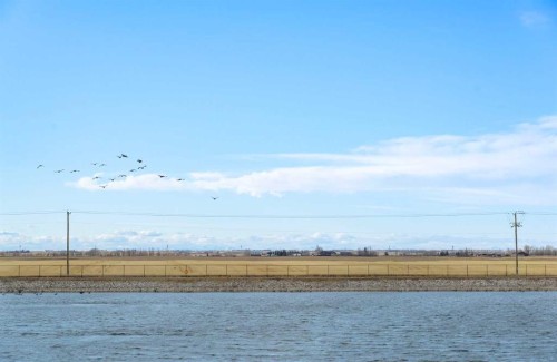 340 Muirfield Crescent, Lyalta, AB - Outdoor With Body Of Water With View