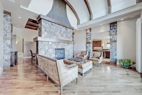 53 Spring Willow Terrace Sw, Calgary, AB - Indoor Photo Showing Living Room With Fireplace