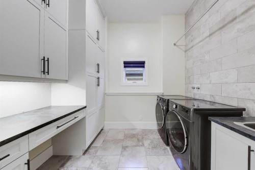 53 Spring Willow Terrace Sw, Calgary, AB - Indoor Photo Showing Laundry Room