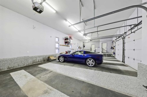 53 Spring Willow Terrace Sw, Calgary, AB - Indoor Photo Showing Garage