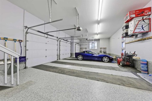 53 Spring Willow Terrace Sw, Calgary, AB - Indoor Photo Showing Garage