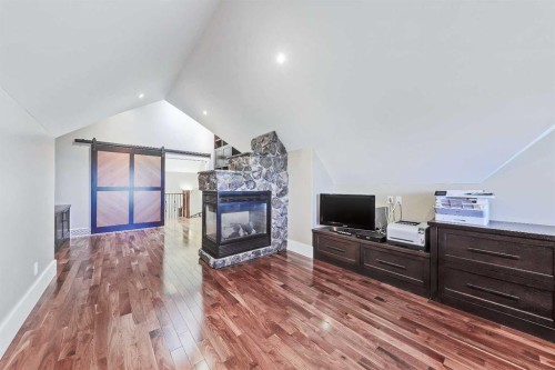 53 Spring Willow Terrace Sw, Calgary, AB - Indoor With Fireplace
