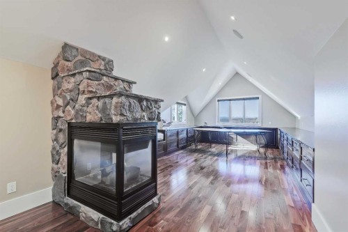 53 Spring Willow Terrace Sw, Calgary, AB - Indoor With Fireplace