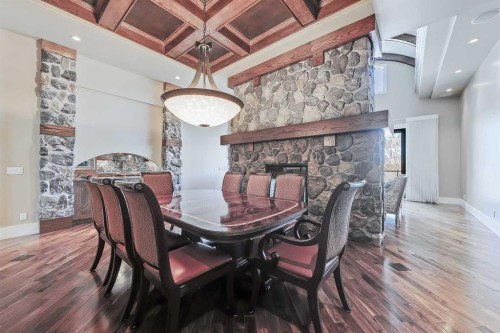 53 Spring Willow Terrace Sw, Calgary, AB - Indoor Photo Showing Dining Room With Fireplace
