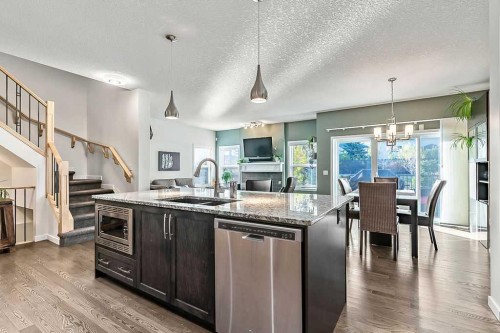 29 Cougar Ridge Close Sw, Calgary, AB - Indoor Photo Showing Kitchen With Double Sink With Upgraded Kitchen