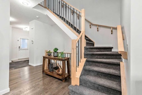 29 Cougar Ridge Close Sw, Calgary, AB - Indoor Photo Showing Other Room