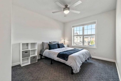 29 Cougar Ridge Close Sw, Calgary, AB - Indoor Photo Showing Bedroom