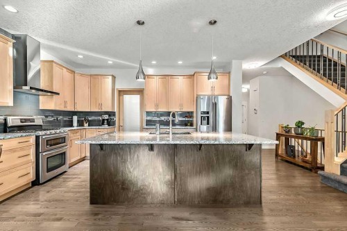 29 Cougar Ridge Close Sw, Calgary, AB - Indoor Photo Showing Kitchen With Upgraded Kitchen