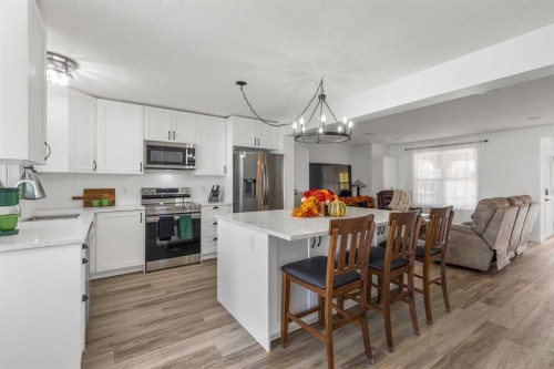 2348 Reunion Rise Nw, Airdrie, AB - Indoor Photo Showing Kitchen With Upgraded Kitchen
