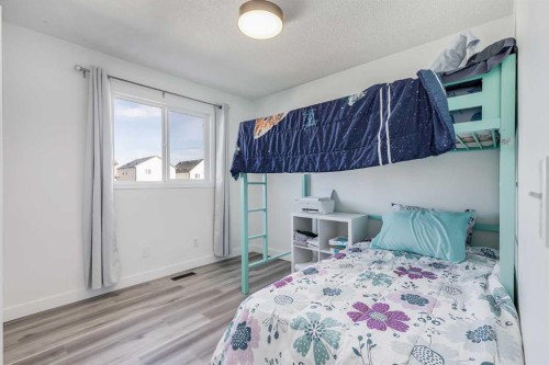 2348 Reunion Rise Nw, Airdrie, AB - Indoor Photo Showing Bedroom