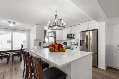 2348 Reunion Rise Nw, Airdrie, AB - Indoor Photo Showing Kitchen With Upgraded Kitchen