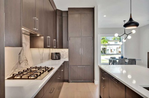 617 19 Avenue Nw, Calgary, AB - Indoor Photo Showing Kitchen With Upgraded Kitchen