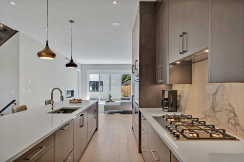 617 19 Avenue Nw, Calgary, AB - Indoor Photo Showing Kitchen With Upgraded Kitchen