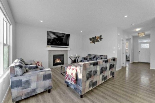 130 Red Sky Crescent Ne, Calgary, AB - Indoor Photo Showing Living Room With Fireplace