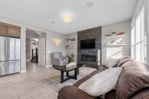 235 Redstone Heights Ne, Calgary, AB - Indoor Photo Showing Living Room With Fireplace