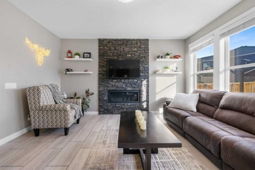 235 Redstone Heights Ne, Calgary, AB - Indoor Photo Showing Living Room With Fireplace