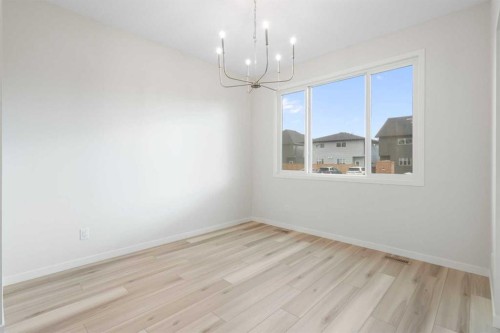 680 Buffaloberry Manor Se, Calgary, AB - Indoor Photo Showing Other Room