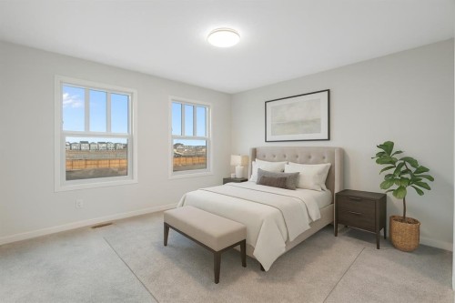 680 Buffaloberry Manor Se, Calgary, AB - Indoor Photo Showing Bedroom