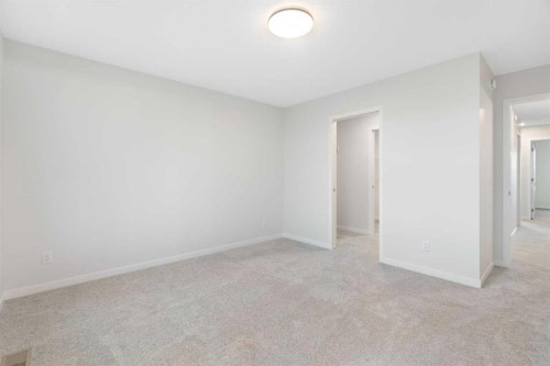 680 Buffaloberry Manor Se, Calgary, AB - Indoor Photo Showing Other Room