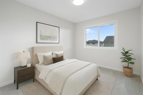 680 Buffaloberry Manor Se, Calgary, AB - Indoor Photo Showing Bedroom