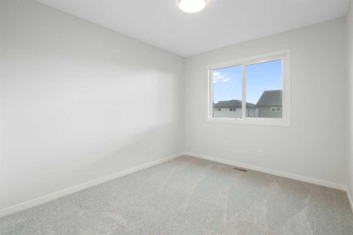 680 Buffaloberry Manor Se, Calgary, AB - Indoor Photo Showing Other Room