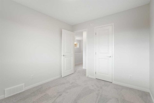 680 Buffaloberry Manor Se, Calgary, AB - Indoor Photo Showing Other Room
