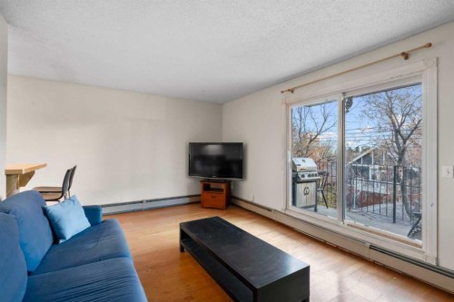 6-2512 15 Street Sw, Calgary, AB - Indoor Photo Showing Living Room