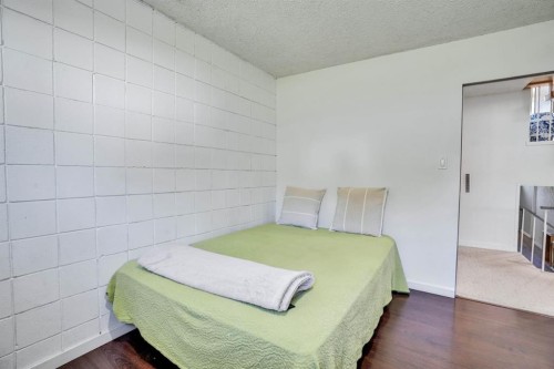 116 Selkirk Drive Sw, Calgary, AB - Indoor Photo Showing Bedroom