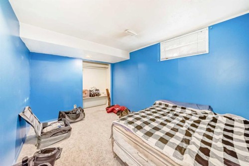 808 Avonlea Place Se, Calgary, AB - Indoor Photo Showing Bedroom