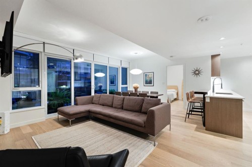 104-128 Waterfront Court Sw, Calgary, AB - Indoor Photo Showing Living Room