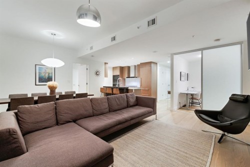 104-128 Waterfront Court Sw, Calgary, AB - Indoor Photo Showing Living Room