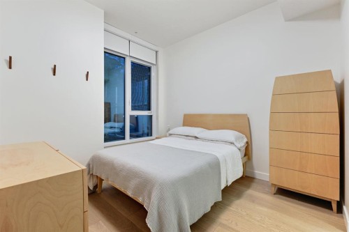 104-128 Waterfront Court Sw, Calgary, AB - Indoor Photo Showing Bedroom