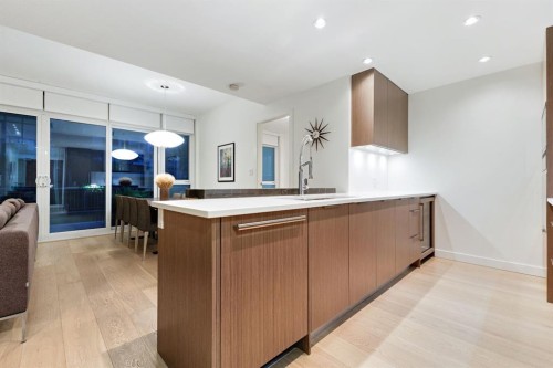104-128 Waterfront Court Sw, Calgary, AB - Indoor Photo Showing Kitchen