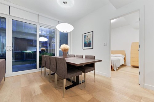 104-128 Waterfront Court Sw, Calgary, AB - Indoor Photo Showing Dining Room